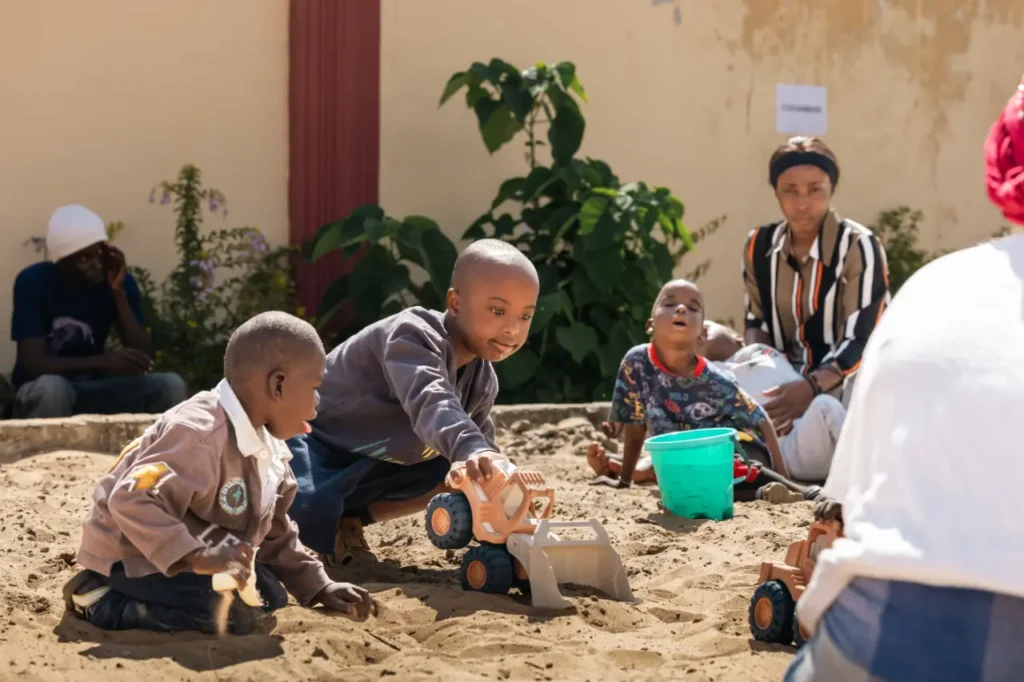 0N0A8612-1280x853q75 The Sadiq Trust - Children playing in sandpit